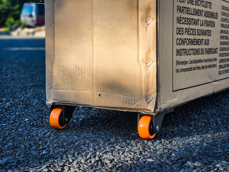 The Nomad turns a standard cardboard bike box into a smooth‑rolling travel case for one‑way, ditch‑the‑box bikepacking adventures.