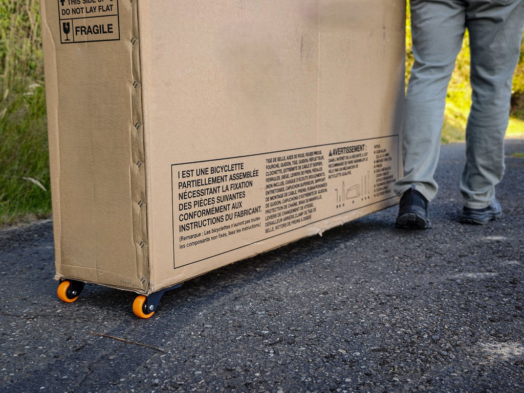 The Roll Pack system turns any cardboard box into a smooth travel case. 